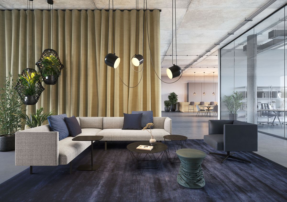 Heller Muud Lite Sessel von Walter Knoll in modernem Büro-Lounge-Bereich mit Sofa.