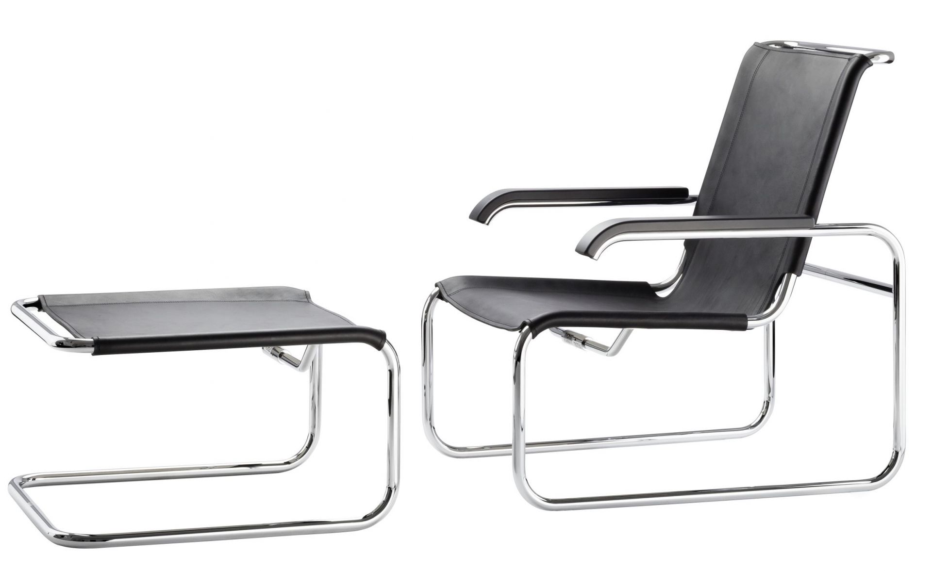Bild eines Thonet S 35 LH Freischwinger Sessels mit Hocker, Leder schwarz, Stahlrohr verchromt.