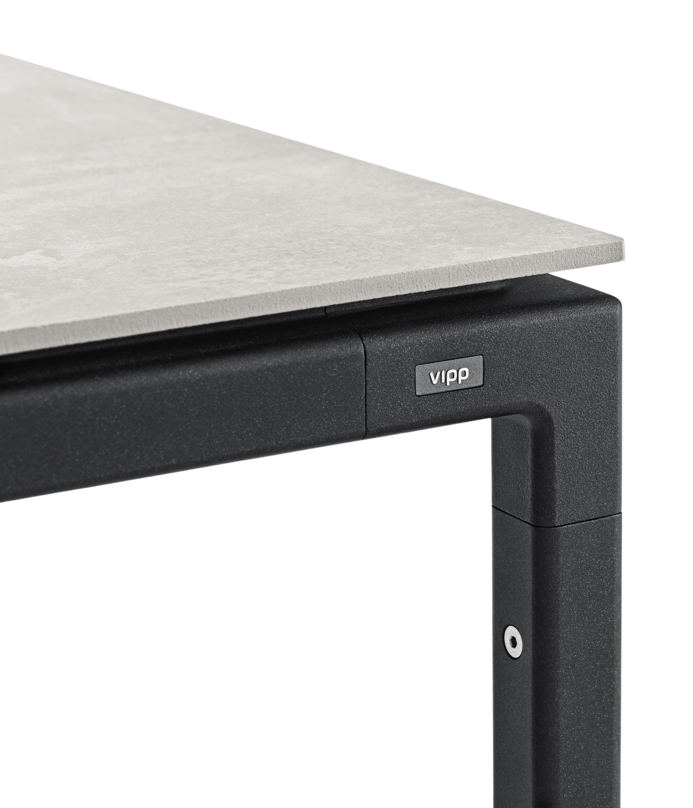 Detailaufnahme vom Vipp Tisch groß mit grauer Tischplatte und schwarzem Metallgestell.