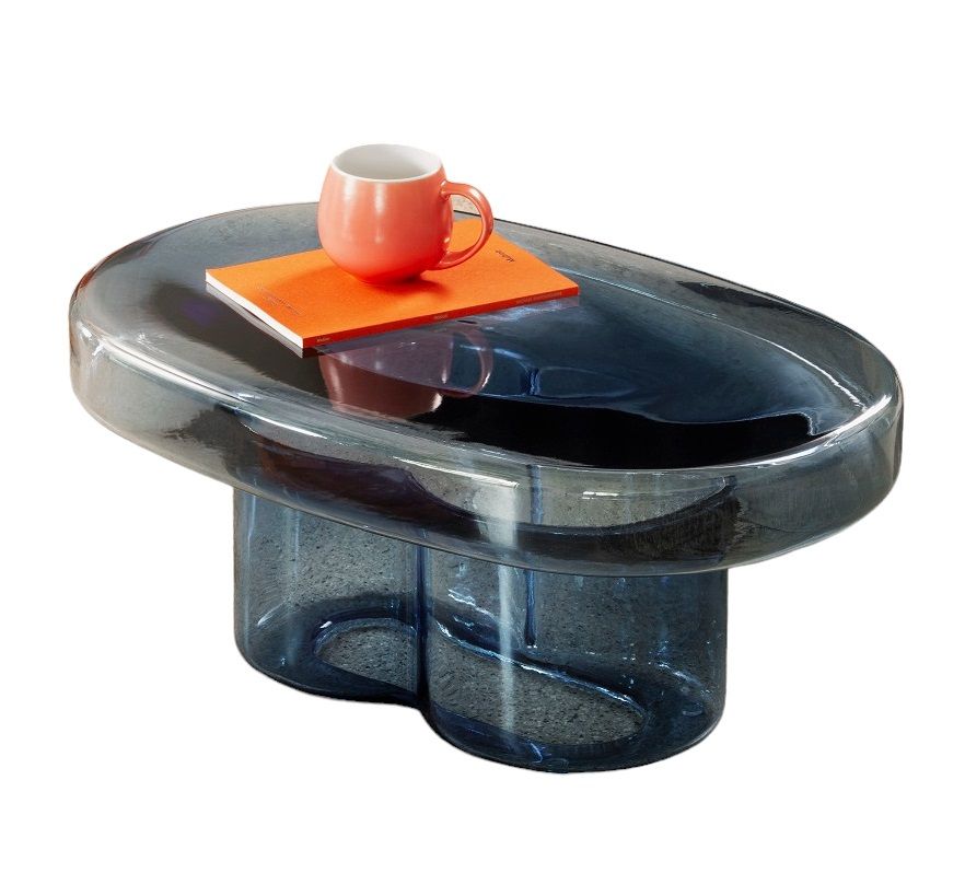 Blauer, ovaler Couchtisch aus Glas, Miniforms Soda, mit Tasse und Notizbuch.