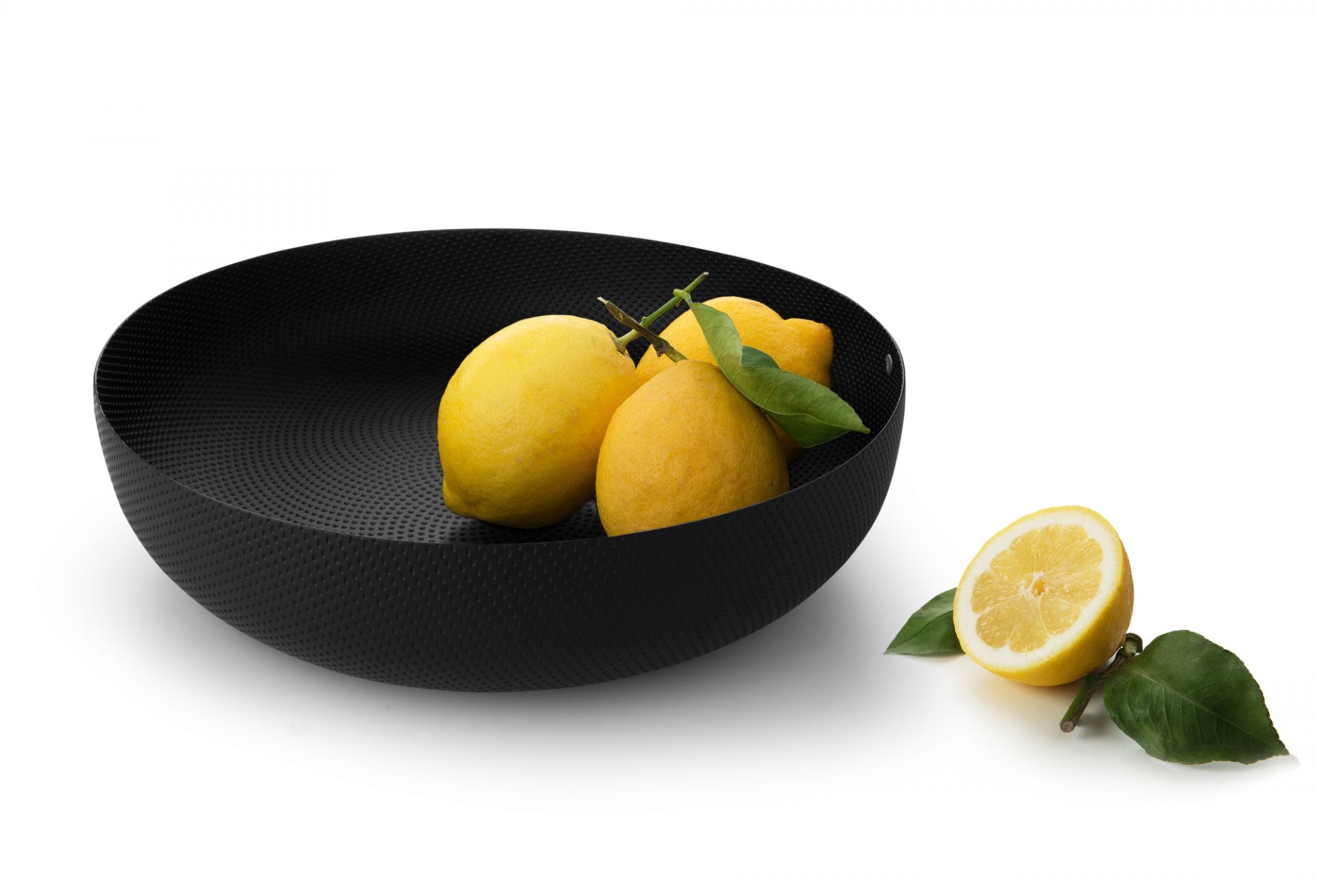 Schwarze Alessi Obstschale JM17/29 mit Zitronen. Runde Designschale für Obst und Dekoration.