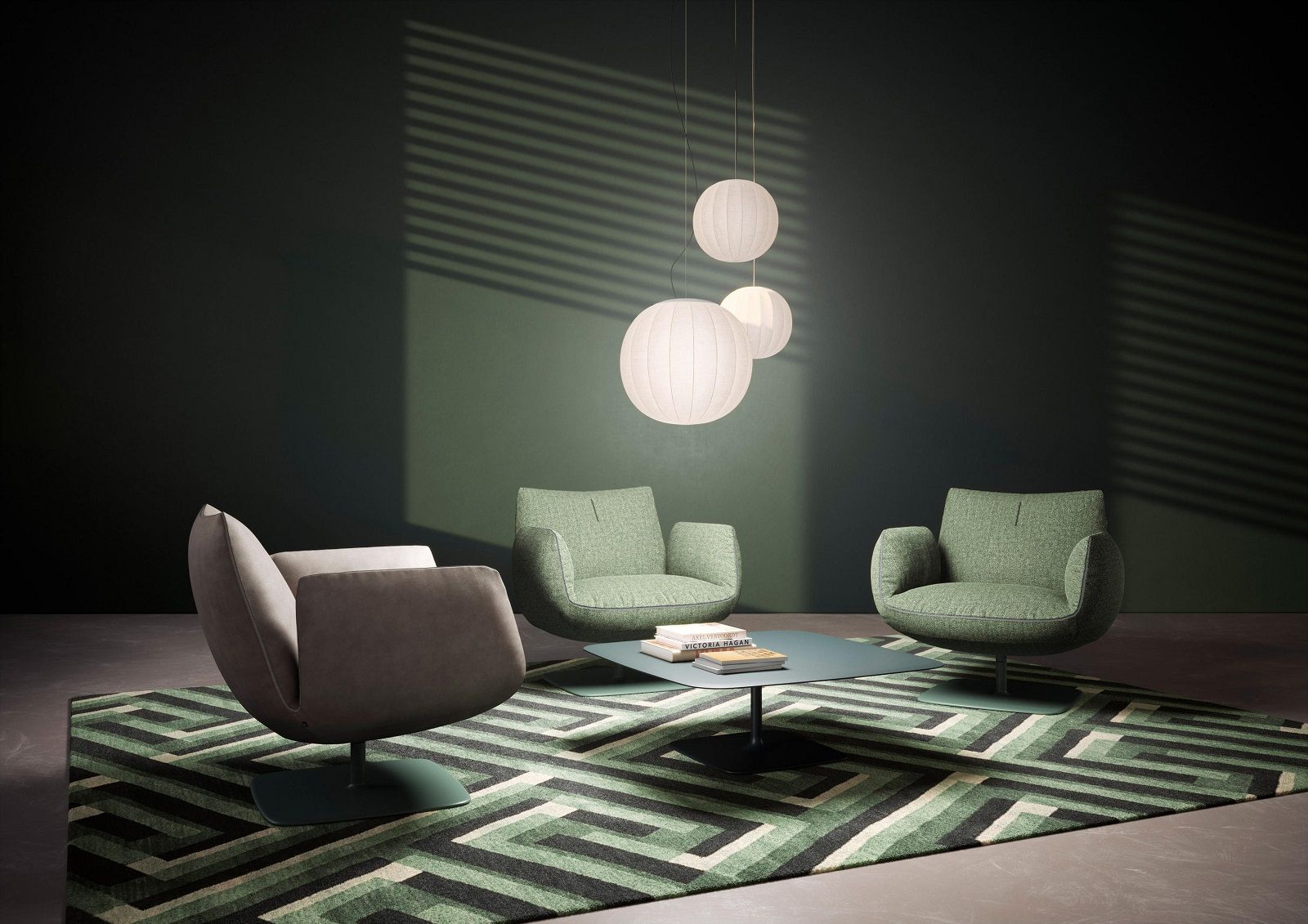 Jalis Clubsessel von Cor, Drehsessel mit Tellerfuß in Grün und Grau auf Teppich.