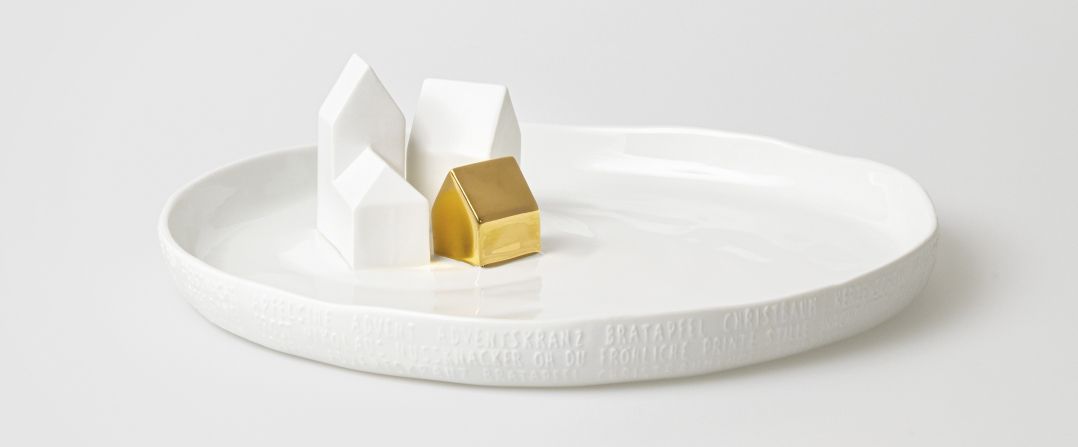 Porzellangeschichten Teller Häuser Räder 