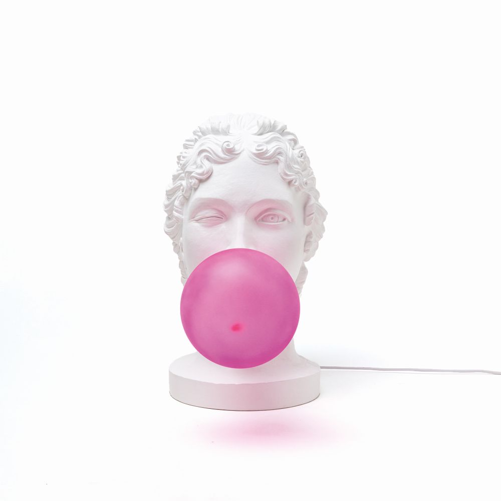 Seletti Grace Lampe: Weiße Büste mit pinkfarbener Kugel als Leuchtmittel, moderne Tischleuchte.