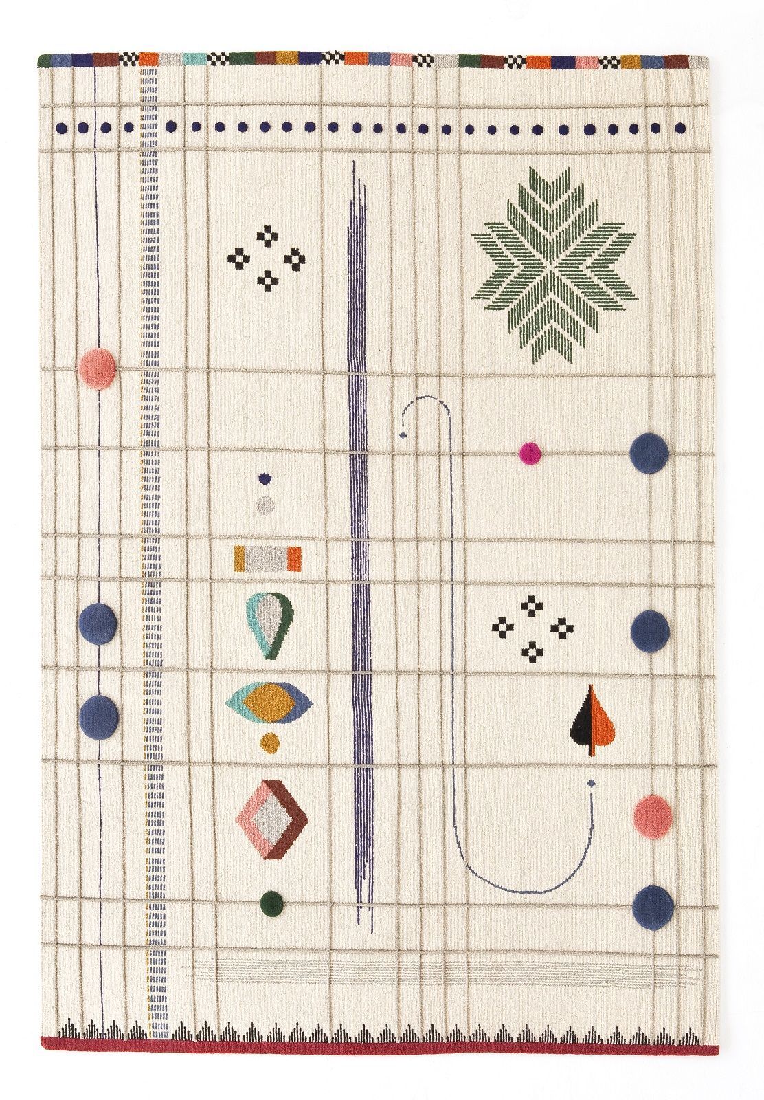 Detailansicht des Rabari Teppichs von Nanimarquina: Handgeknüpfter Wollteppich mit bunten, abstrakten Mustern und dekorativen Pompons.