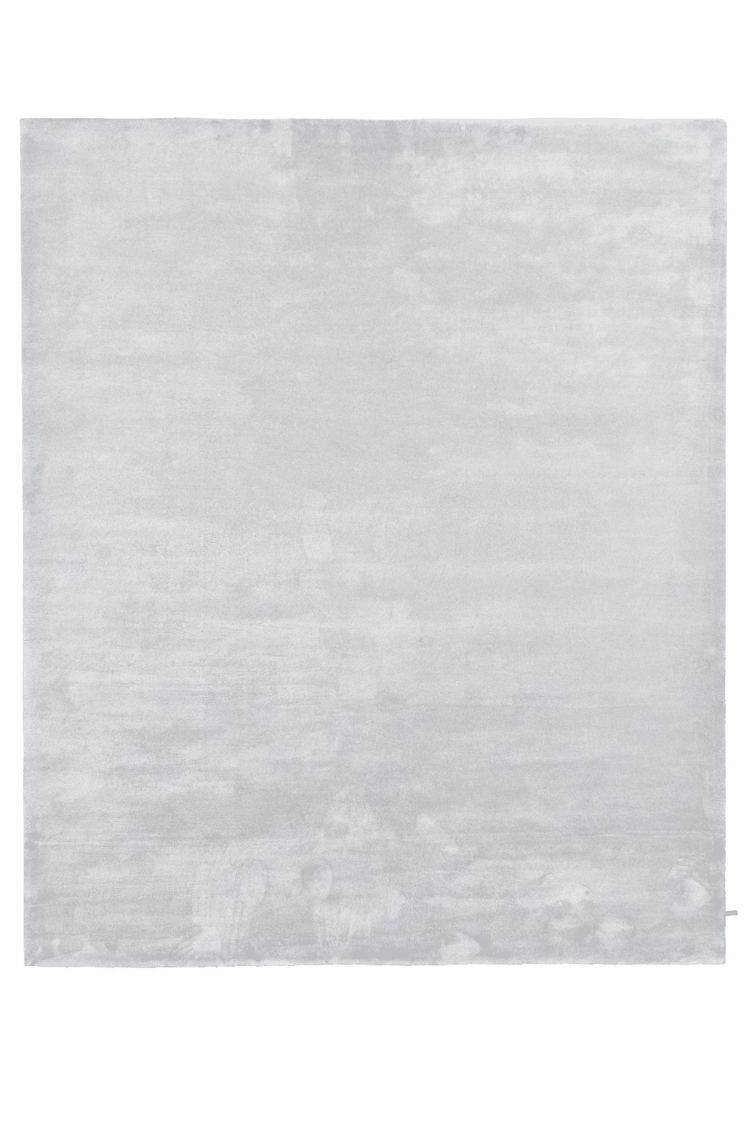 Detailansicht des hellgrauen Neolo Pro Velvet Teppichs von miinu, weiche Textur.