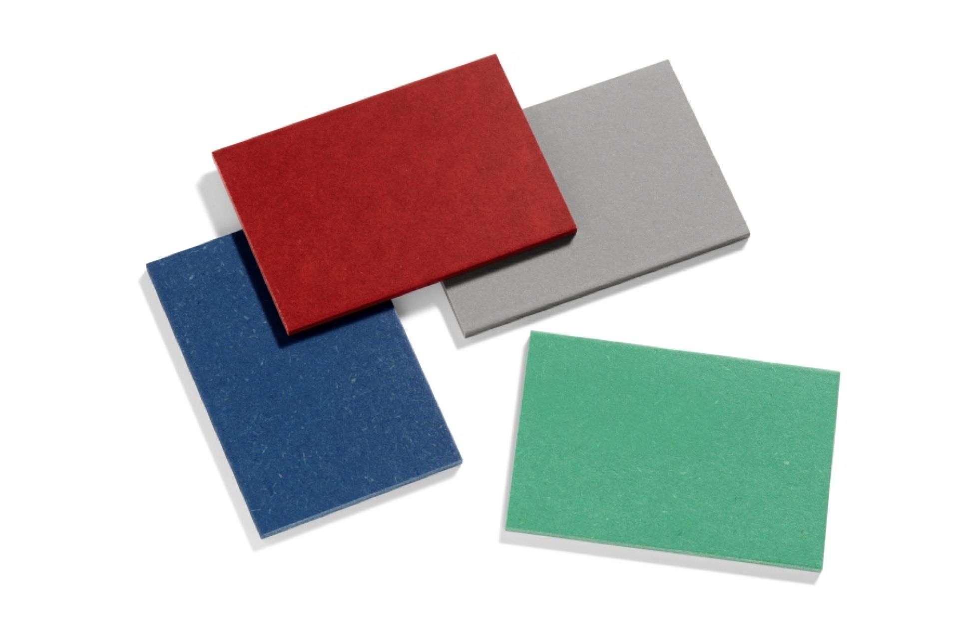 Farbmuster für Hay Two Colour Table Tischplatte in Blau, Ocker, Rot und Grau auf weißem Hintergrund.