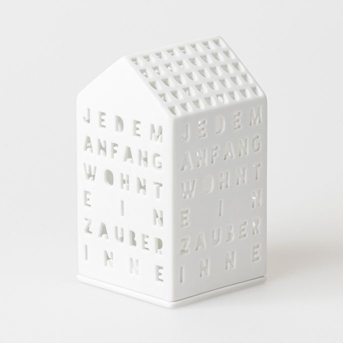 Weißes Lichthaus "Jedem Anfang wohnt ein Zauber inne" von Räder, stimmungsvolle Dekoration für Zuhause.