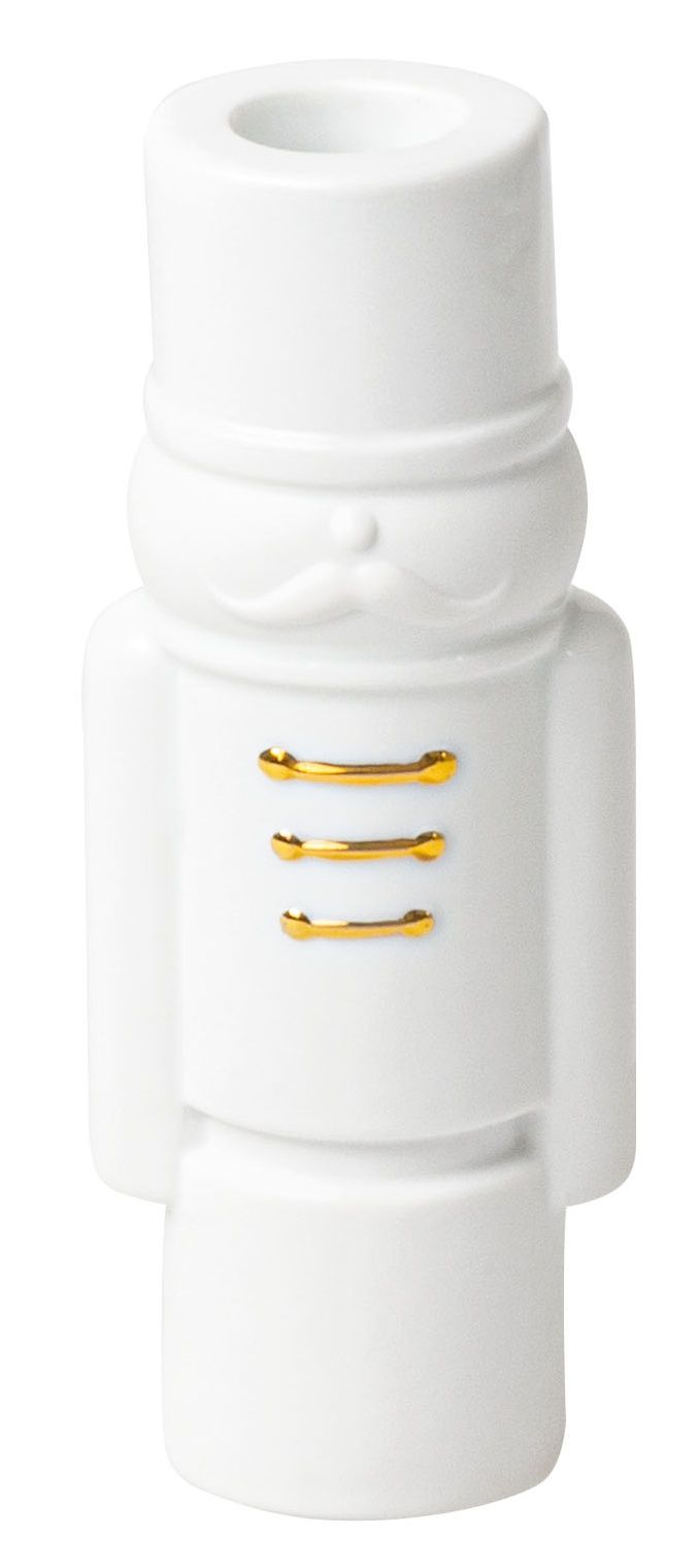 Weißer Nussknacker Kerzenhalter von Räder, Linus oder Magnus, festliche Weihnachtsdekoration mit goldenen Akzenten.