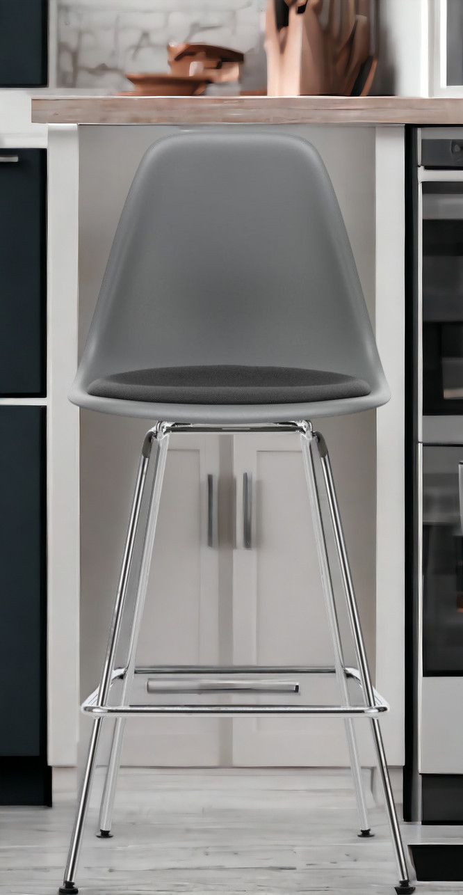 Eames Plastic Bar Stool Barhocker Medium mit Sitzpolster Vitra