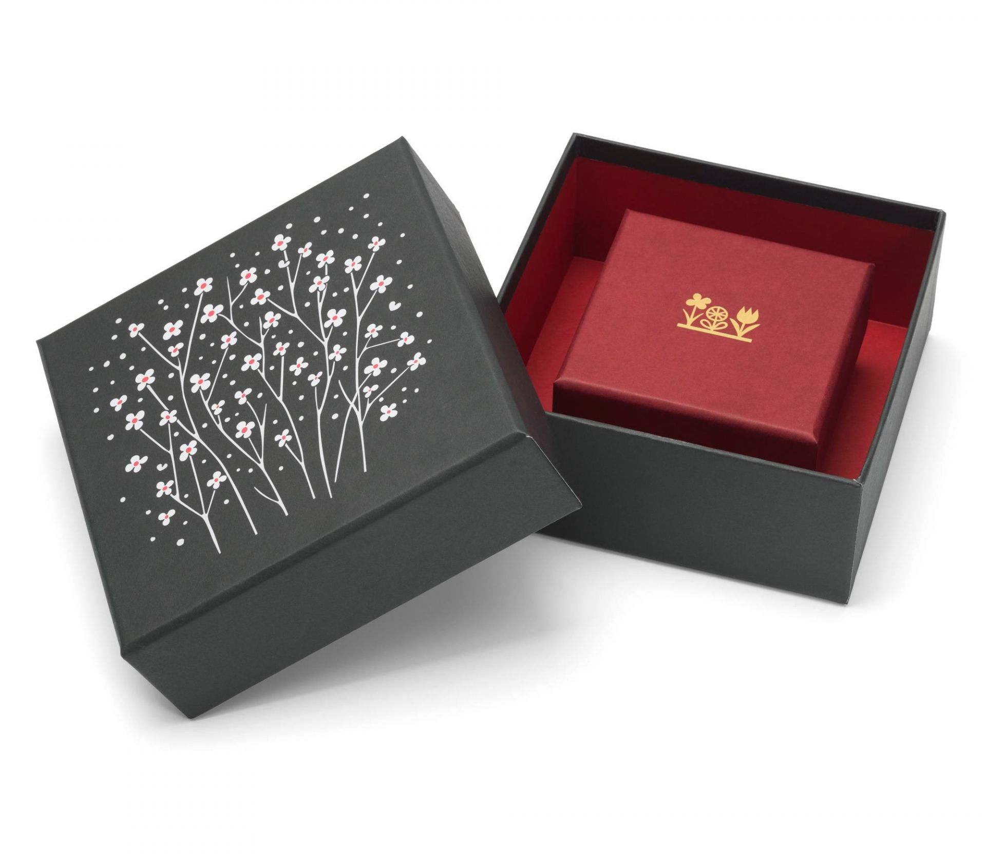 Geöffnete Graphic Boxes Aufbewahrungsbox von Vitra, schwarz mit Blumenmuster, innen rote Box. Dekorative Aufbewahrung.