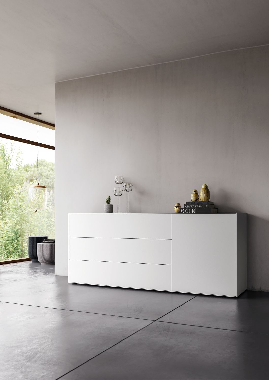 Weißes Nex Pur Box Lowboard von Piure mit Schubladen und Tür in modernem Wohnraum.