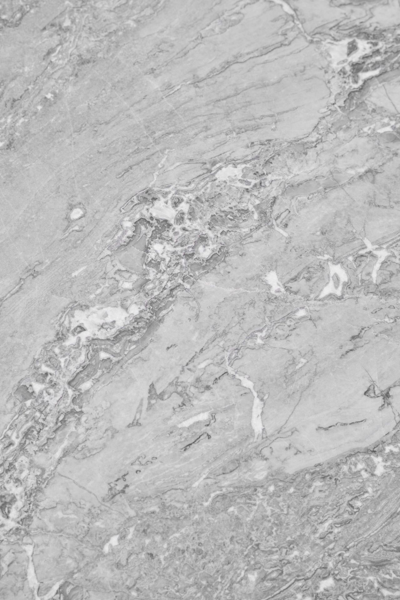 Detailaufnahme der Marmorplatte des Vipp Square Couchtischs. Moderner Wohnzimmertisch mit edler Oberfläche.