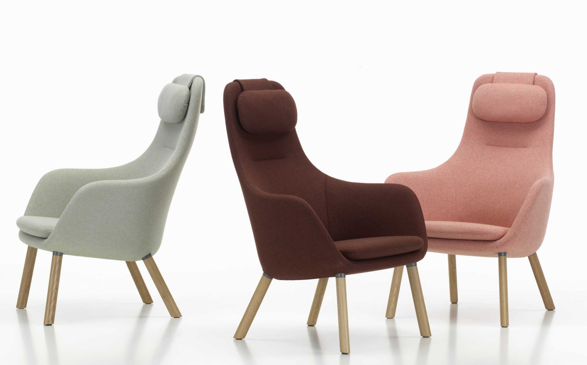 Drei Hal Lounge Chair Sessel von Vitra in Grau, Braun und Rosa.