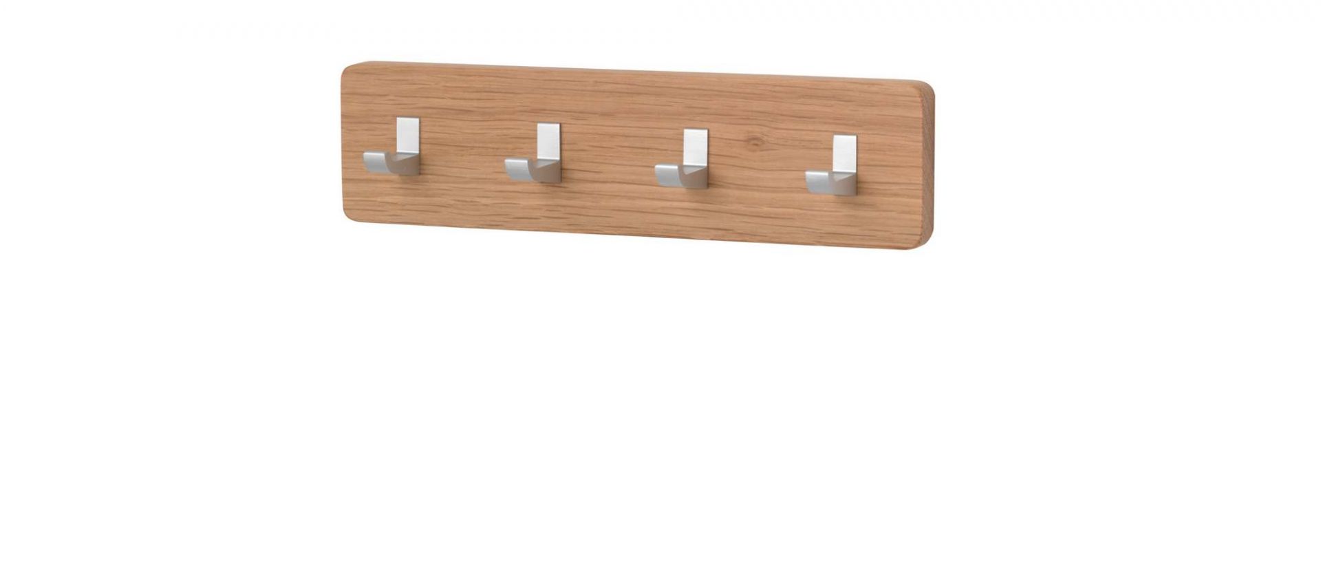 Schönbuch Key Bar Schlüsselhakenleiste aus Eiche mit vier silbernen Haken für Schlüssel und Accessoires.
