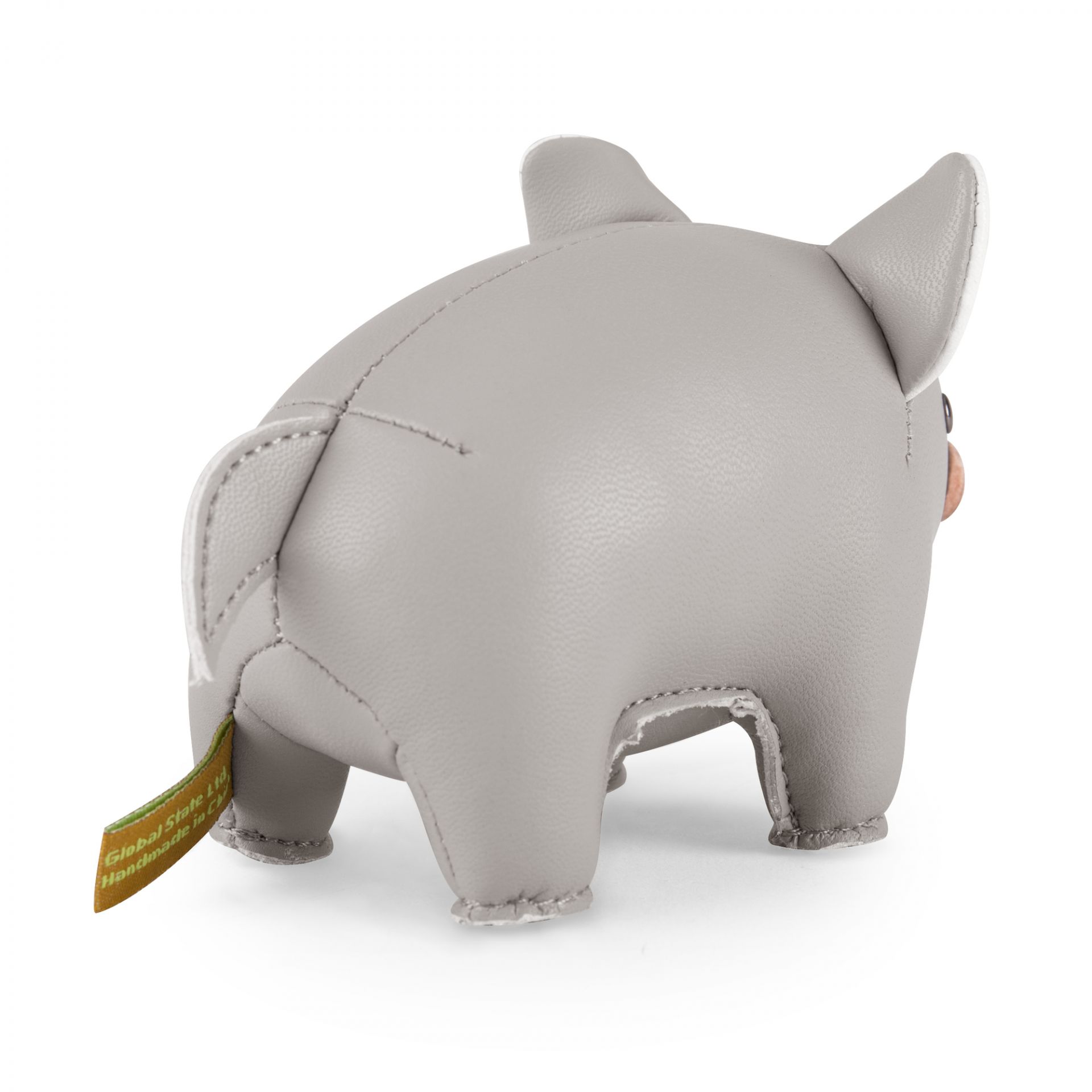 Rückansicht des Züny Briefbeschwerer Schwein in Grau/Weiß, ein dekoratives Accessoire für Büro und Zuhause.