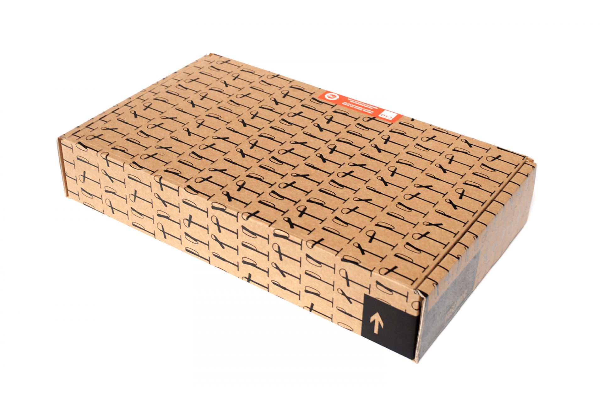 Verpackungskarton der Foscarini Magneto LED Tischleuchte mit Muster und Hinweisen zum Öffnen.