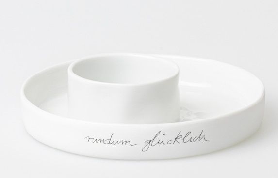 Weiße Räder Schale "Rundum Glücklich" aus Porzellan, ideal als Dipschale oder für Snacks.