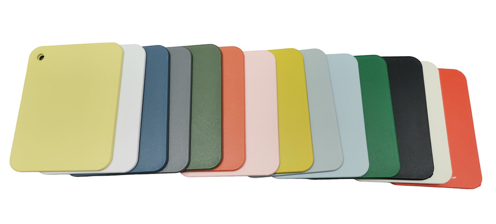 Farbmusterkarte: Vitra Eames Plastic Chairs, Farben 2024. Kunststoffmuster in Gelb, Weiß, Grau, Grün, Rosa, Blau, Schwarz, Rot.