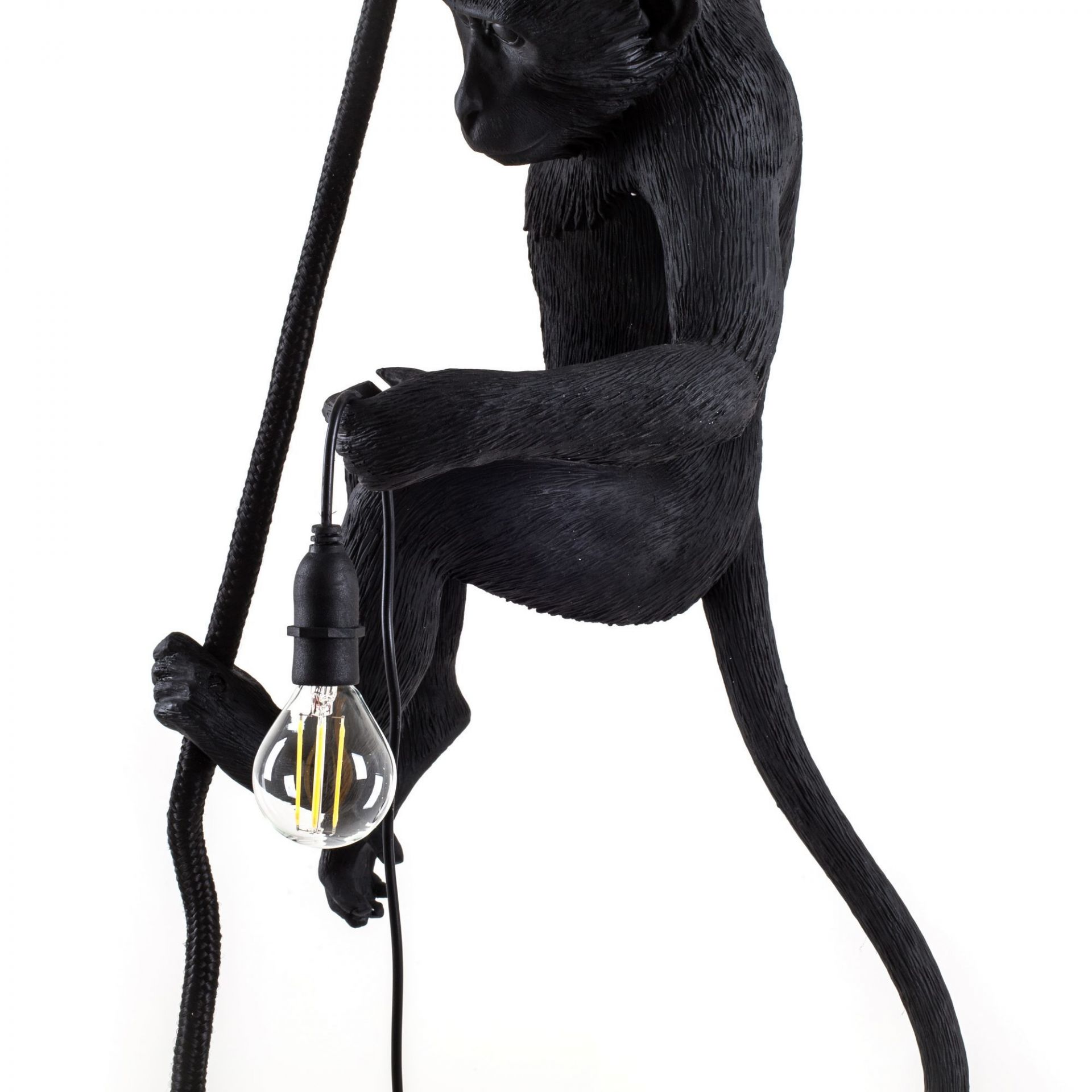 Schwarze Monkey Lamp Pendelleuchte von Seletti: Affe hält Glühbirne an einem Seil. Designlampe.