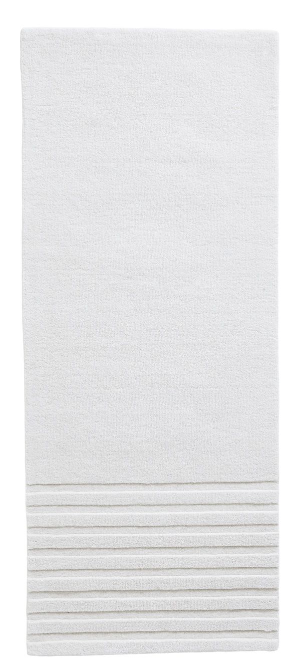 Weißer Kyoto Rug Teppich von Woud, 80x200 cm, mit dekorativen Linien am unteren Ende.