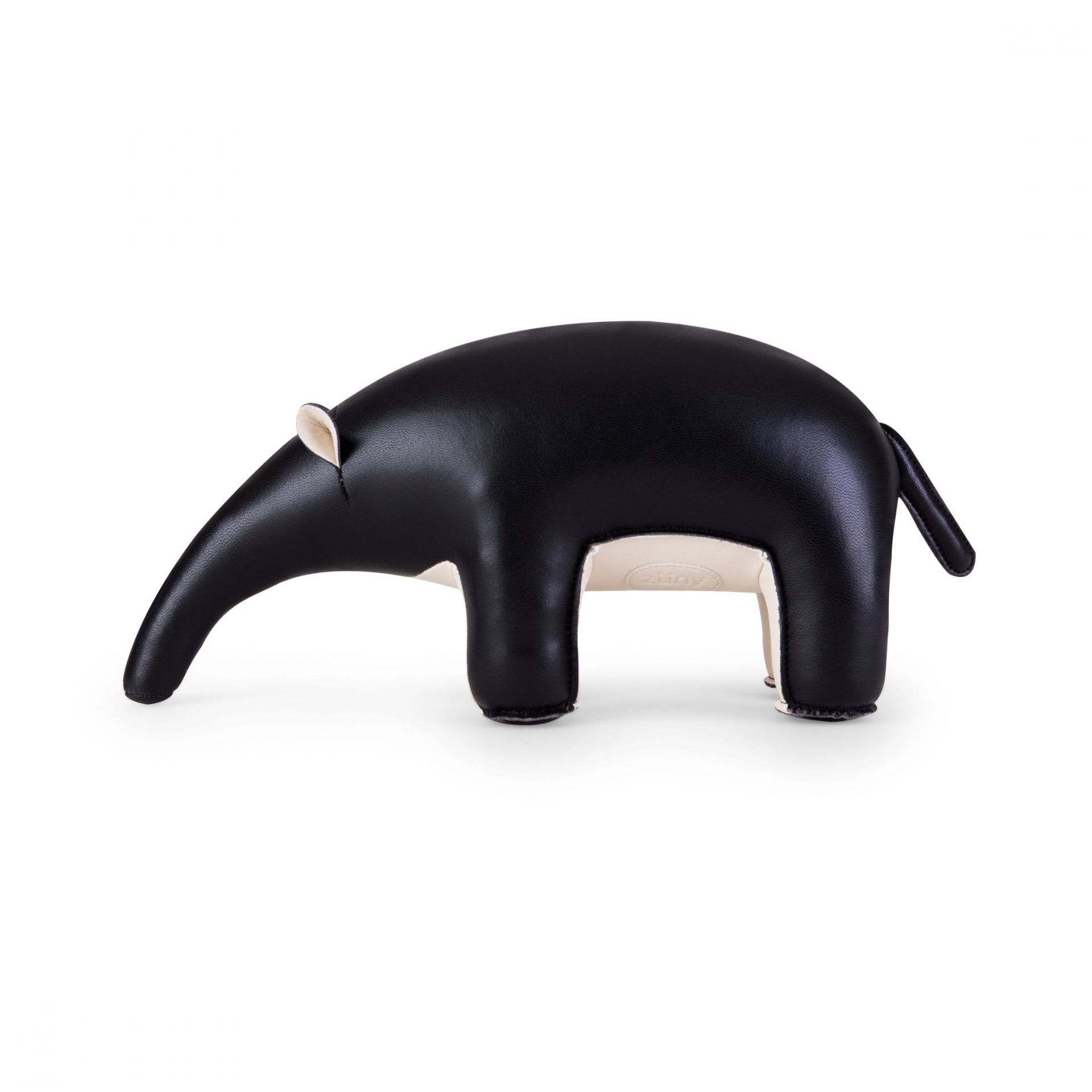 Buchstütze Ameisenbär von Züny, schwarz-weizenfarben, aus Kunstleder, dekorativ und funktional für Bücherregale.