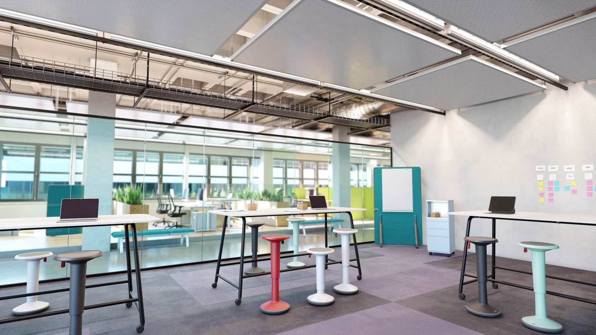 Interstuhl UPis1 Stehhocker in verschiedenen Farben im modernen Büro, ideal für dynamisches Sitzen und Steharbeitsplätze.