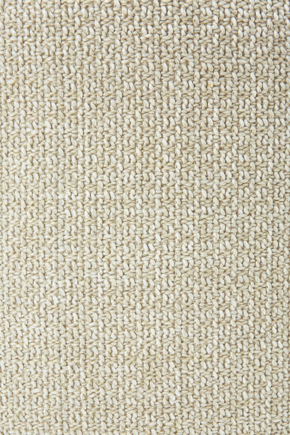 Detailaufnahme des beigen Stoffbezugs vom Ethnicraft Donut Sitzhocker für den Außenbereich.