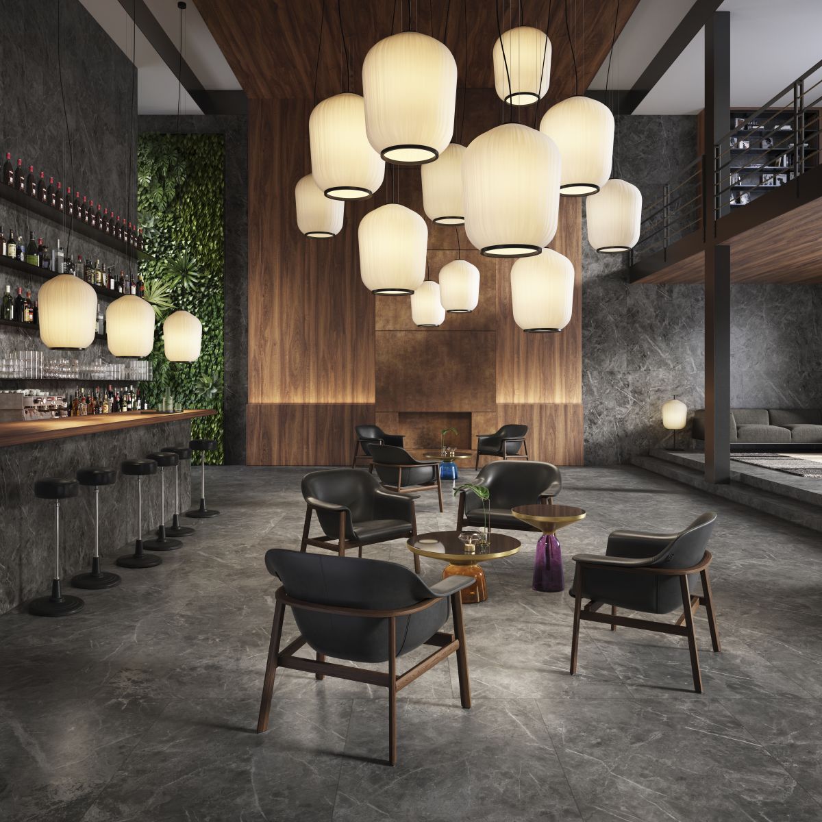 Innenaufnahme mit mehreren ClassiCon Plissée Pendelleuchten in Messing über einer Bar und Sitzbereich.