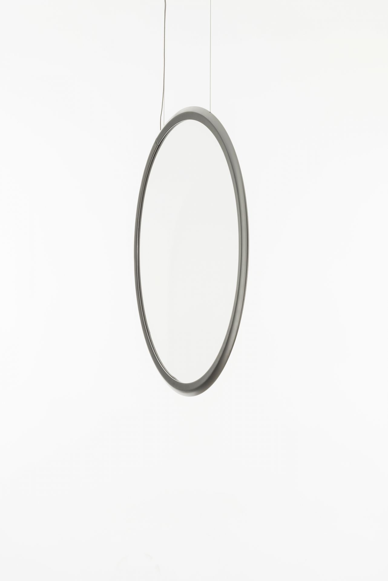 Discovery Vertical Pendelleuchte von Artemide: Runde Hängeleuchte aus Aluminium, modernes Design für Wohnräume.