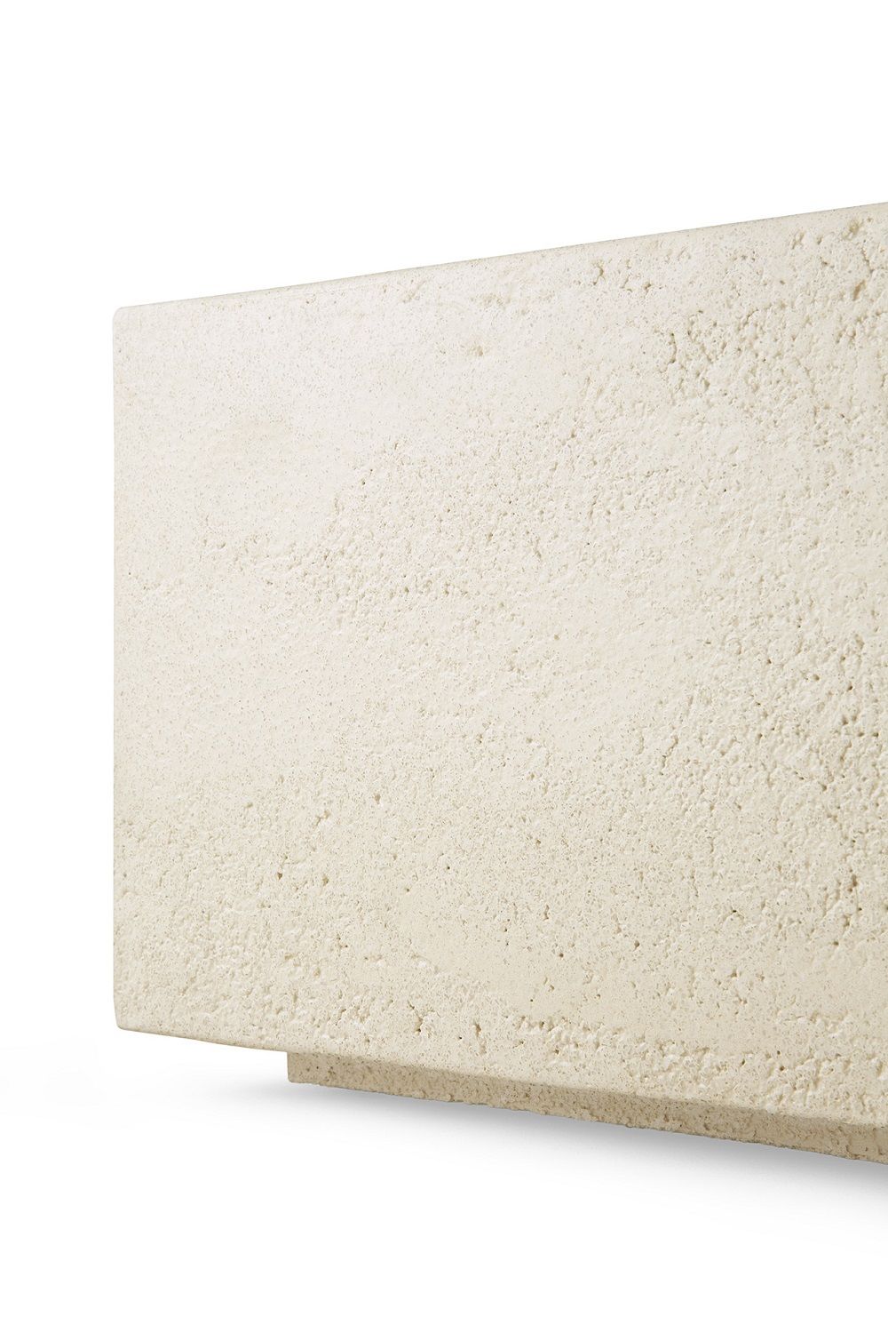 Detailaufnahme des Ethnicraft Elements Couchtischs in Off White mit Microzement-Oberfläche.