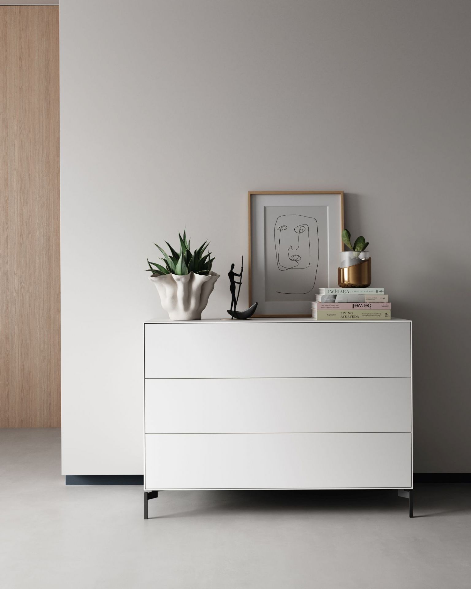 Weißes Piure Nex Pur Box Board mit drei Schubladen und Deko-Elementen.