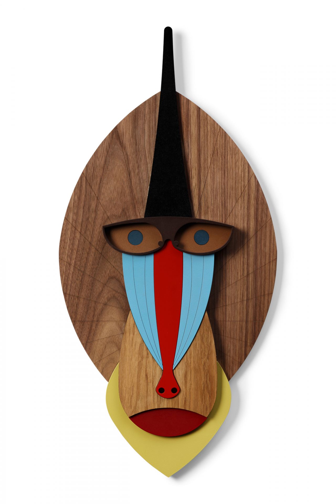 The Mandrill Wandschmuck von Umasqu, ein einzigartiges, farbenfrohes Holzobjekt für die Wand, handgefertigt und dekorativ.
