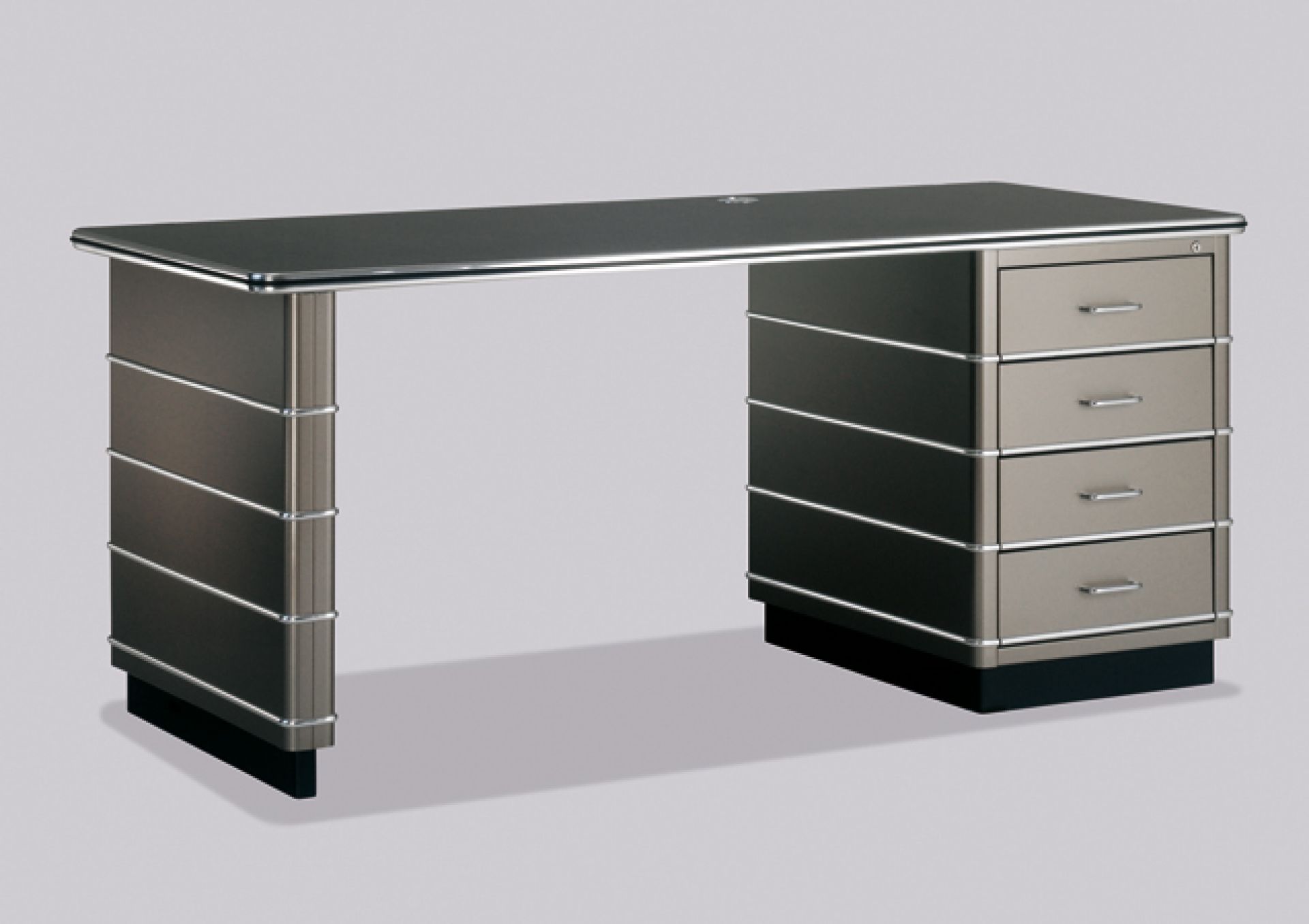 TB 225 Classic Line Schreibtisch von Müller Möbelfabrikation in Grau mit vier Schubladen und Kabeldurchlass.