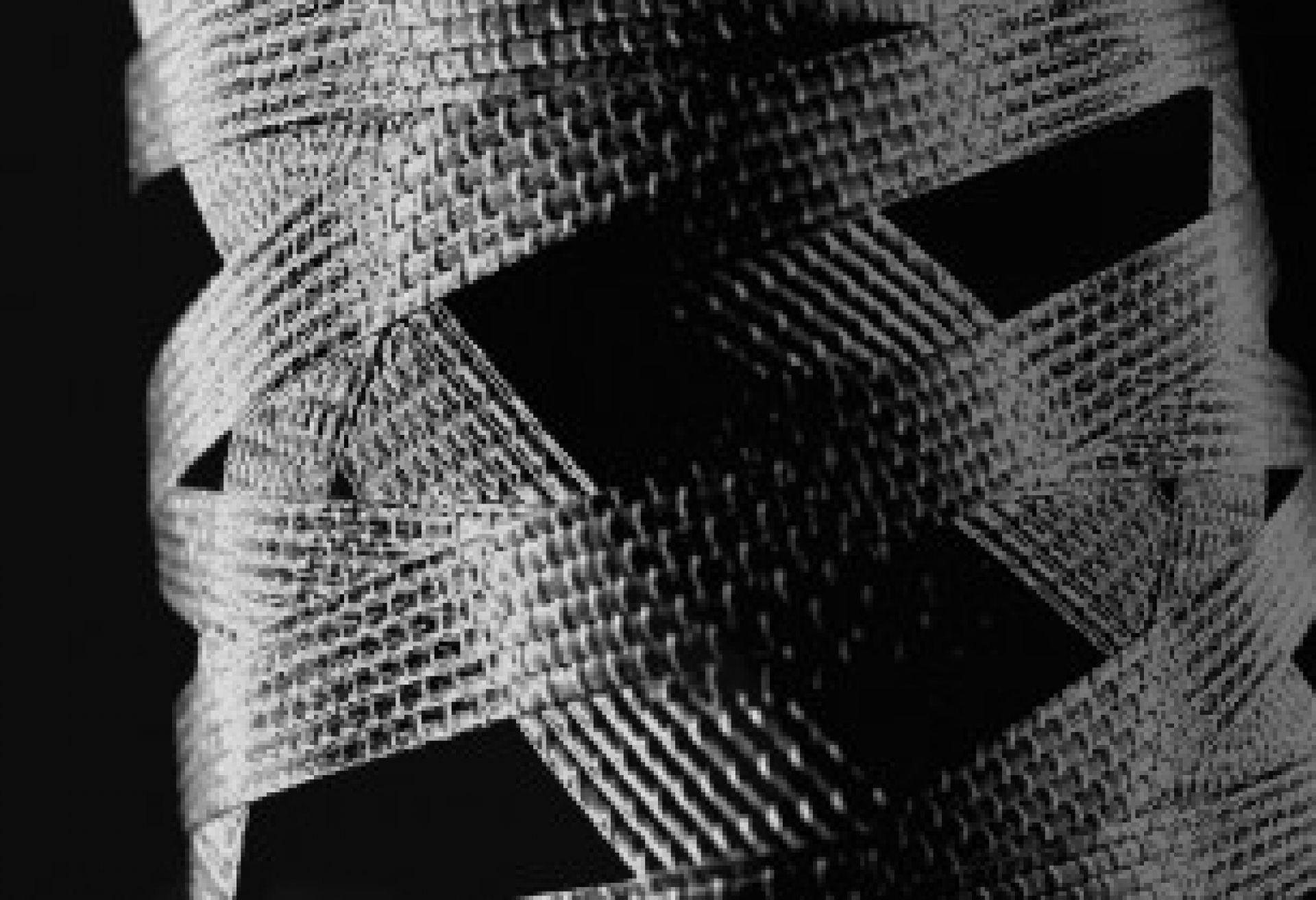 Detailaufnahme der Tress Grande Stehleuchte von Foscarini in Schwarz, geflochtene Optik, modernes Design.