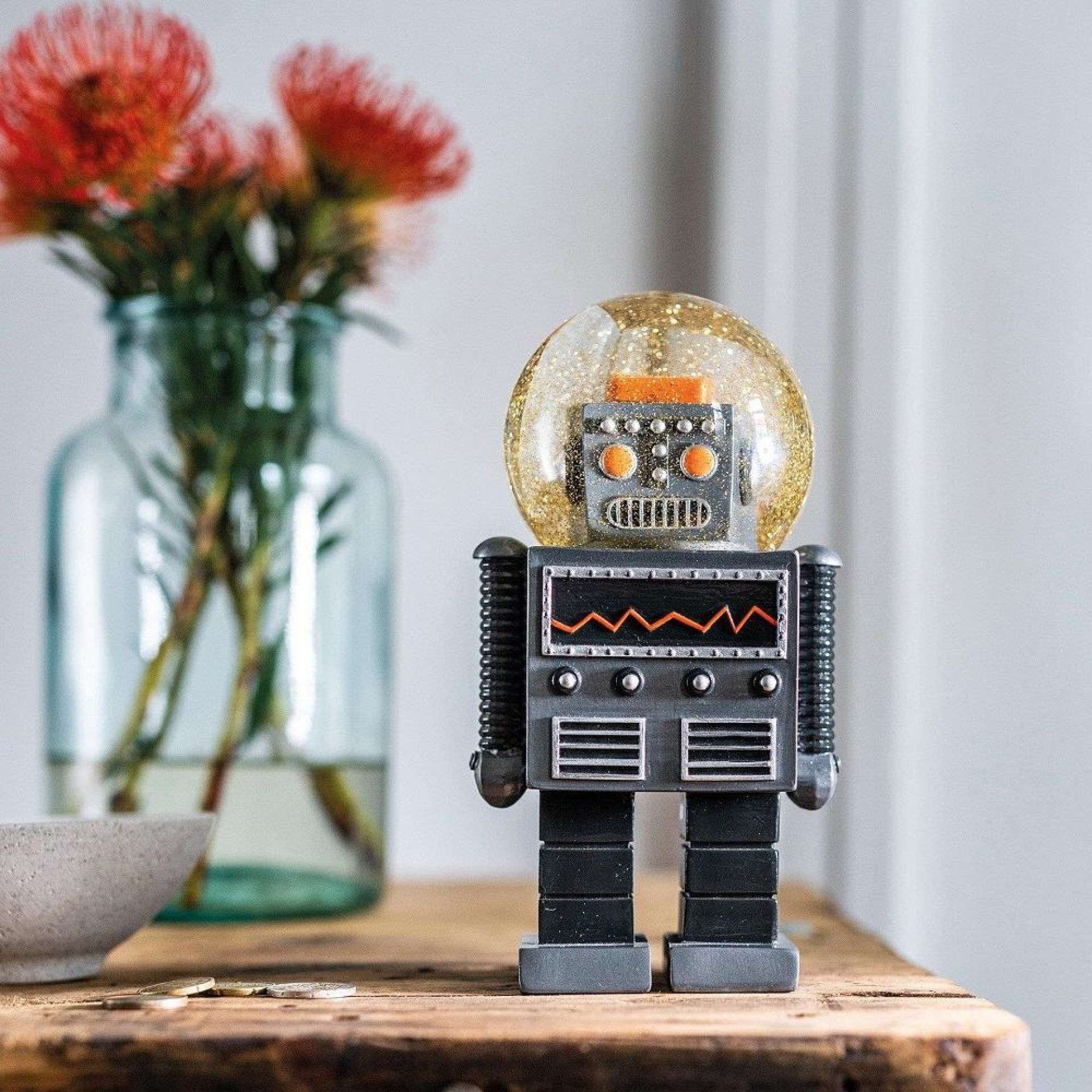 Glitzerkugel mit Roboter-Motiv von Donkey, ein dekoratives Einzelstück für Sammler und Liebhaber.