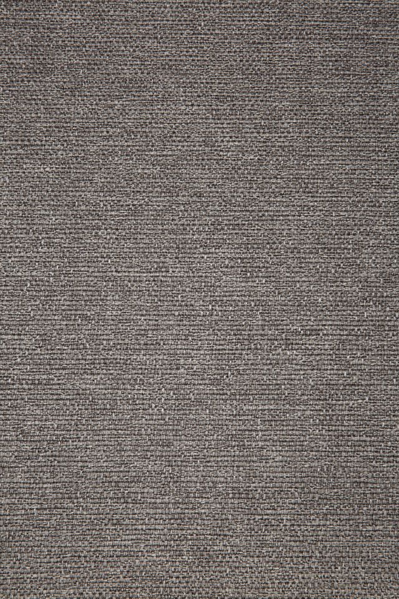 Detailaufnahme des mokkafarbenen Stoffbezugs vom Jack Outdoor Polsterhocker von Ethnicraft.