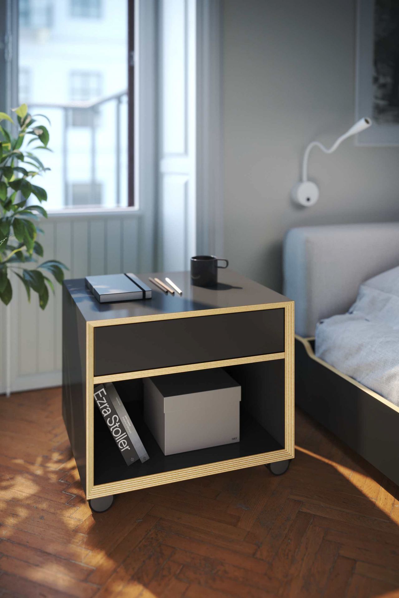 Vertiko Kommode von Müller Möbelwerkstätten in Schwarz mit Schublade und offenem Fach als Nachttisch.