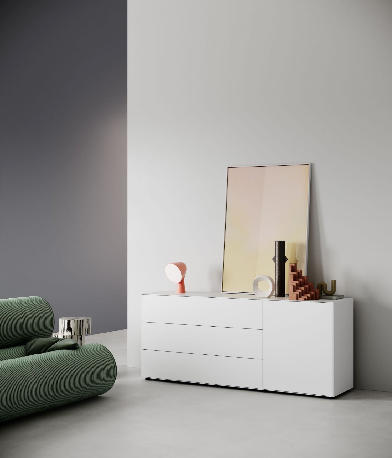 Weißes Nex Pur Box Lowboard von Piure mit Schubladen und Tür im modernen Wohnzimmer.